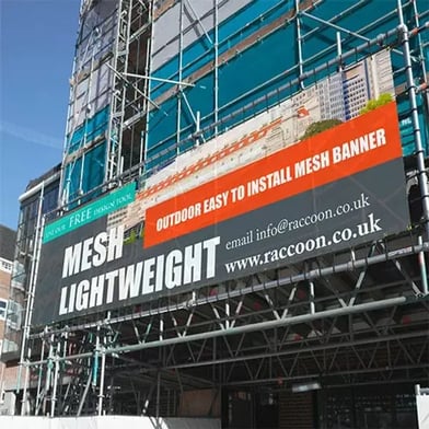 Posters vs Banners - A Mesh Banner on Scaffolding