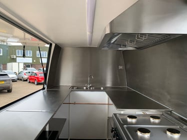 The kitchen inside the 'Cruisin Cuisine' vehicle conversion.